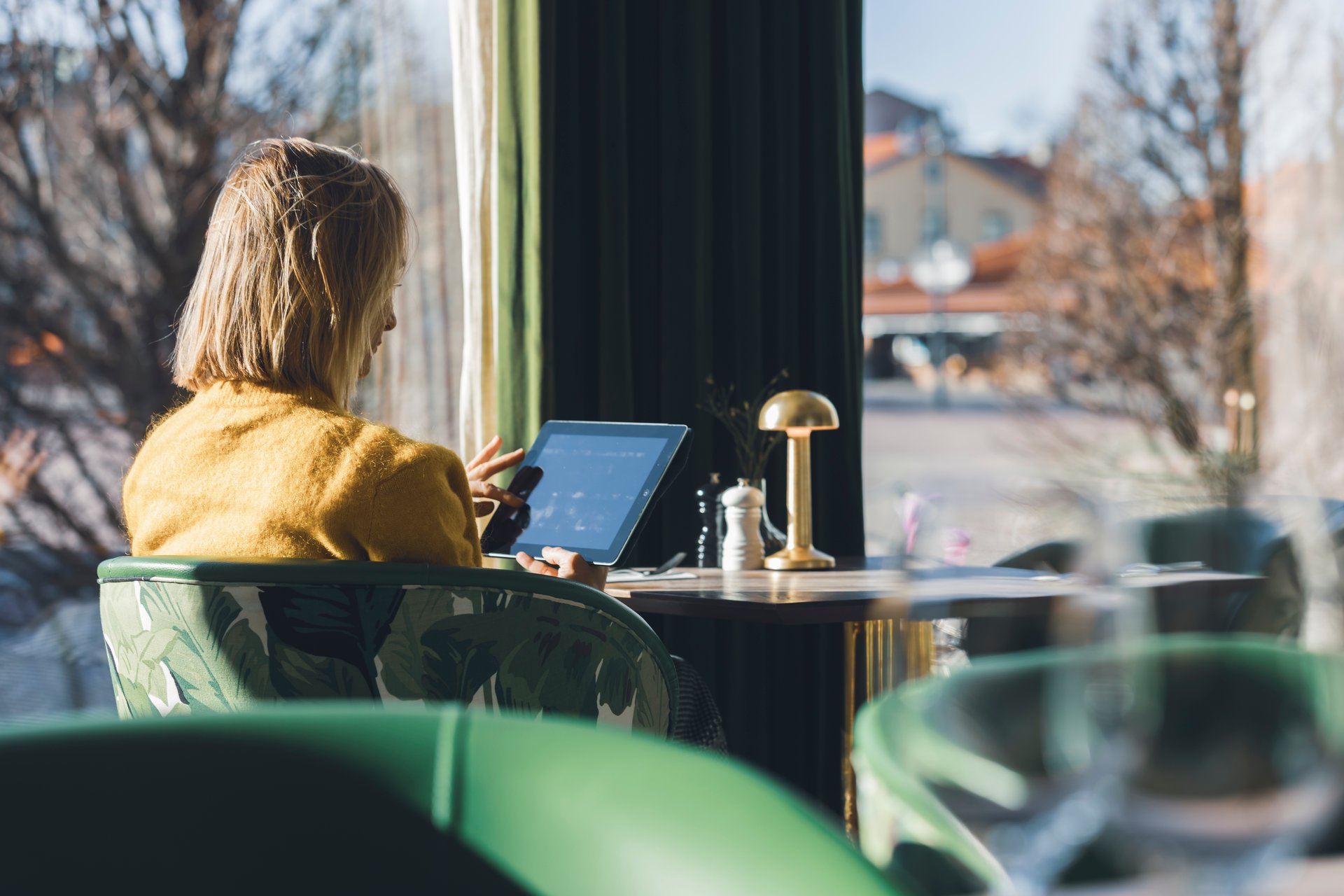 Girl reading news on tablet-1